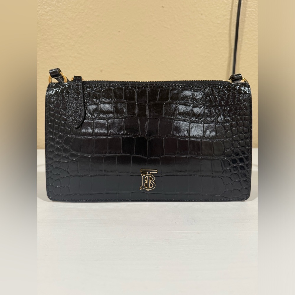 Gently used Burberry Embossed Leather Mini TB
Shoulder Pouch